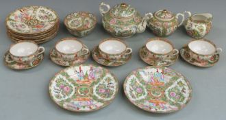 A 19thC/20thC Chinese famille rose tea set including cake plates.