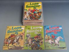 Thirty-nine Dell and Gold Key Lone Ranger and Tonto comic books including a number of scarce photo