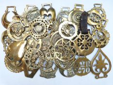 Approximately 38 19th/20thC horse brasses, subjects include Churchill, Queen Victoria, Field Marshal