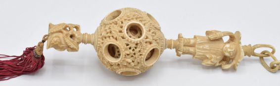 A 19thC Chinese carved ivory puzzle ball, 16cm