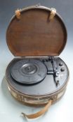 A record turntable in the form of a leather case