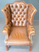 Brown leather Chesterfield wing back armchair