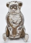 Chinese white metal pepper in the form of a bear or lemur with character marks to base, H5.5cm