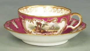 Minton cup and saucer decorated with landscape scenes