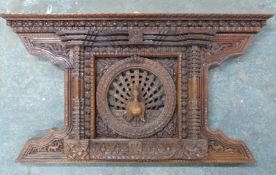 Indian carved hardwood wall plaque with peacock decoration, W66 x D9 x H36cm