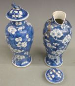 Two 19thC Chinese prunus vases with character marks to base, H23cm