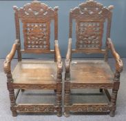 Pair of 19th/20thC carved elm seated Chinese armchairs decorated with auspicious symbols, horned