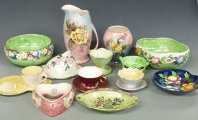 A collection of Maling and Royal Winton lustre ware dishes, bowls, vases and jugs in various