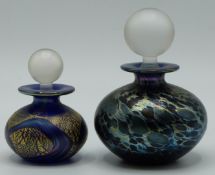 Two Isle of Wight iridescent glass scent bottles with stoppers, largest 9.5cm tall.