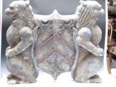 Large coat of arms flanked by two lions or mythical creatures, of polystyrene or similar