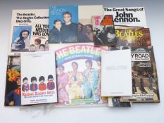 A collection of Beatles books including paperbacks from the 1960's and The Summer of 1968 (numbered)