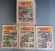 Fifty-four issues of The Hornet comic books/ magazines from 142 (1966) to 442 (1972)