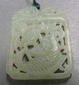 Chinese pierced jadeite pendant/ carving depicting a fish.