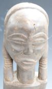 A 19thC/20thC carved African tribal figure, probably Yoruba tribe, H47cm