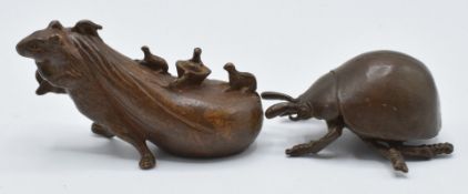 Two Japanese bronzes, a mouse carrying a sack with creatures on and a beetle, both signed to base,