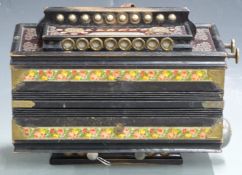 Campbells 'Improved' melodeon with two stops, ten brass treble buttons and two bass and with bell,