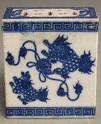 A 19th/20thC Chinese blue and white pierced porcelain pillow, 15x13x7cm.