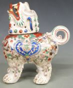 An early 20thC Dog of Fo pot pourri with printed mark Aeiozon, D.R.G.R. to base, H18cm