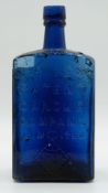 Victorian large wedge shaped cobalt blue bottle for Prices Patent Candle Company Limited, 22cm tall.