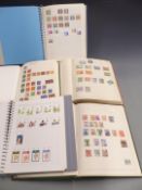 Two Freelance and a Senator stamp album of all-world and used stamps, and two modern albums of UK