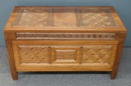 An Eastern hardwood chest with carved geometric decoration, W91 x D43 x H52cm