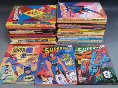 Thirty-one super hero annuals including The Phantom, Superman, Batman, Super Adventure, Super DC,