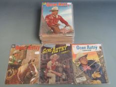Thirty-eight Dell Gene Autry comic books.