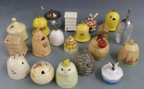 Twenty honey pots including Crown Devon, Charmouth Pottery, several Goebel, Clarice Cliff, plated