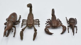 Four Japanese bronzes, two scorpions and two beetles, two marked to base, largest 9 x 3.6cm