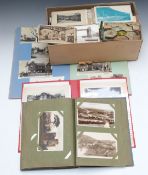 Three albums of postcards and a box of loose examples to include London, railway interest, Wales,