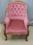 Victorian mahogany upholstered armchair raised on gnurled cabriole legs, W69 x H98cm