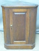 Oak corner cupboard, W57 x H77cm