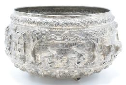 Indian/ Burmese white metal rice bowl with deep relief decoration of pastoral scenes or rice