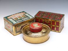 Four biscuit tins comprising Huntley & Palmers brass ship example, two William Crawford examples and