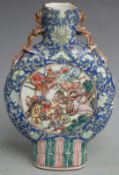 A 19thC Chinese moon flask with figural decoration and dragon handles, H 24cm