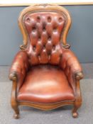 Red Chesterfield style arm chair