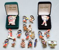Nineteen Golly badges including Christmas World Cup '98 and sporting examples