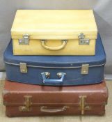 Four pieces of vintage luggage including graduated cases