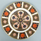 Two Lladro and one Nao figure and a Royal Crown Derby 1128 pattern plate, tallest 23cm