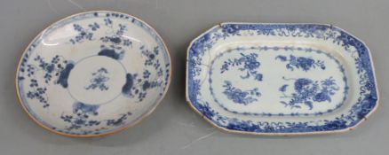 Two 19th/ 20thC Chinese blue and white dishes both with floral decoration, one 22cm in diameter, the