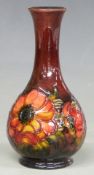 Moorcroft flambé pedestal vase in the Clematis pattern, with Queen Mary paper label and impressed