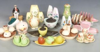 A collection of mainly Cartonware / Royal Winton cruets, toast racks and tableware etc