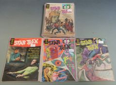 Thirteen Gold Key Star Trek comic books.