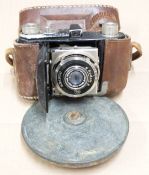 Collection of cameras, spirit flasks, leather tape measures, Jolly Tumbler game, Georgian brass,