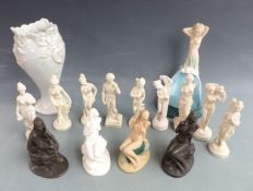 A group of Heredities and other classical style figures and an Art Nouveau style Portuguese lustre