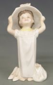Four Lladro figures and a Royal Doulton figure, tallest 33cm