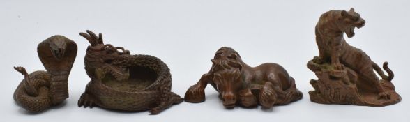 Four Japanese bronzes, a dragon, tiger, horse and snake, all marked to base, largest 5.8 x 6cm