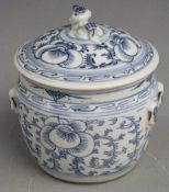 A 19thC Chinese blue and white lidded jar with finial in the form of a mythical creature, H15.5cm