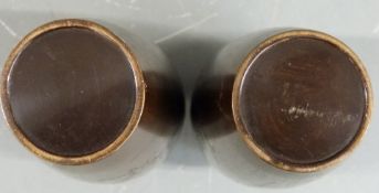 A pair of Japanese Meiji period bronze vases with inlaid silver bird decoration, H19cm