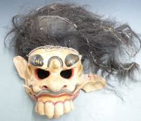 Four bronze tribal figures, painted mask, studio stone pot with indistinct signature to the base,